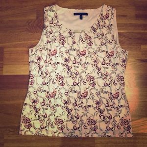 Sleeveless top with neck detail